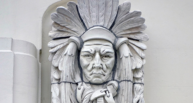 Terra cotta façade of a Native American Figure designed by Victor Schneider, 1916